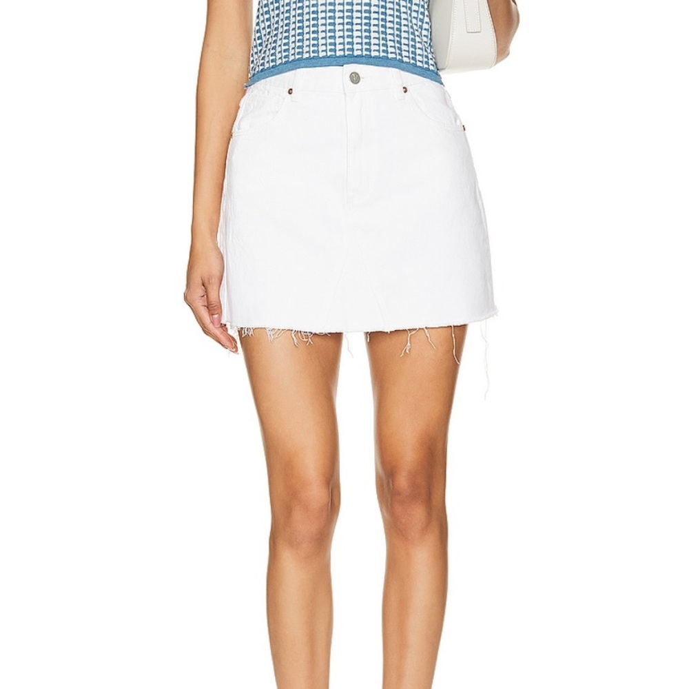 High waisted skirt, slightly distressed hemline